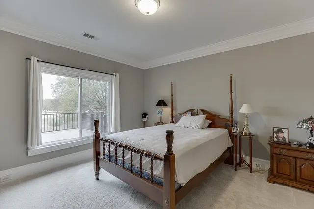 a view of a kitchen with a sink and wooden floor