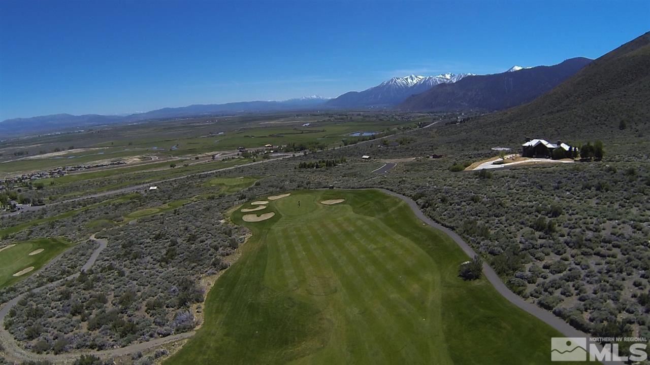 324 James Canyon Loop, Unit 44 Genoa, NV 89411 - Photo 5 of 40 a view of a lake with mountains in the background