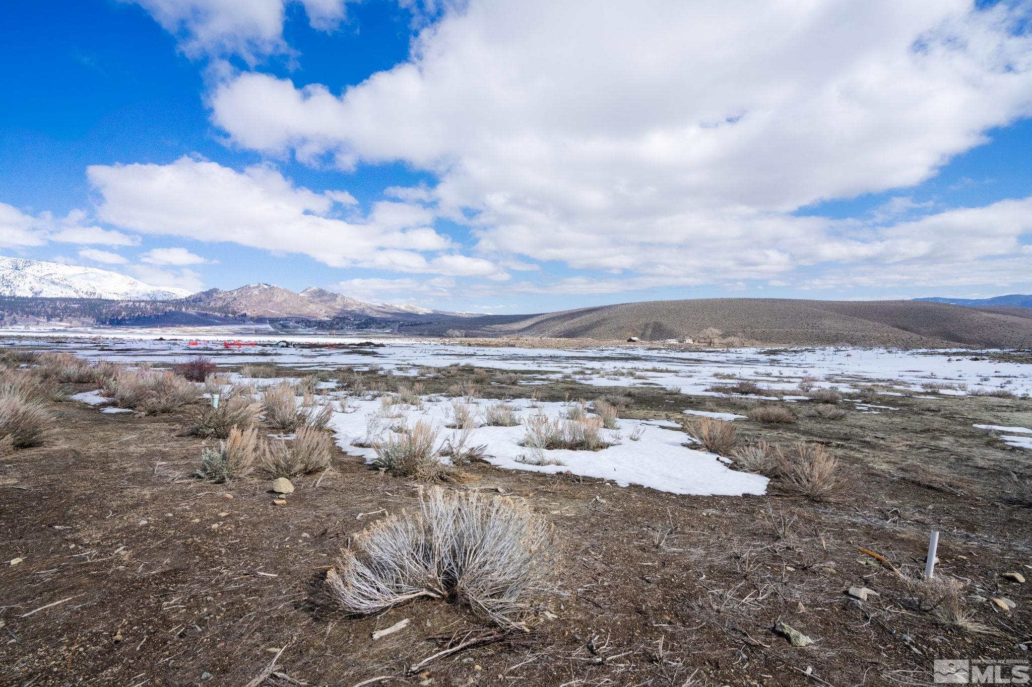 324 James Canyon Loop, Unit 44 Genoa, NV 89411 - Photo 7 of 40 a view of a lake with a city