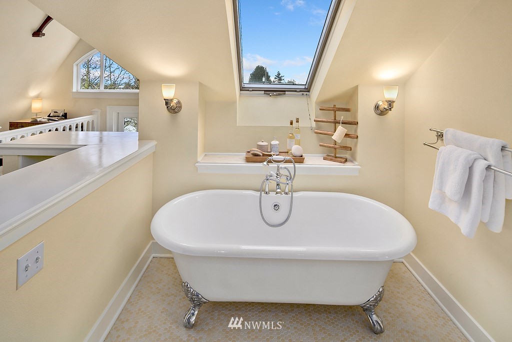 537 Northeast 82nd Street Seattle, WA 98115 - Photo 15 of 28 a bathroom with a sink and a mirror