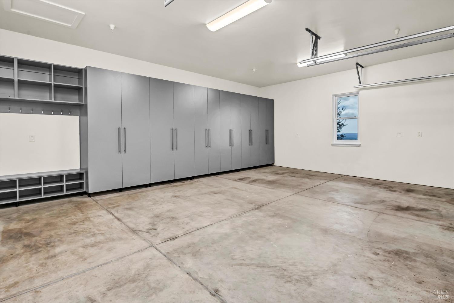 2144 Wedgewood Way Santa Rosa, CA 95404 - Photo 60 of 66 Three Car garage with builtin cabinets!