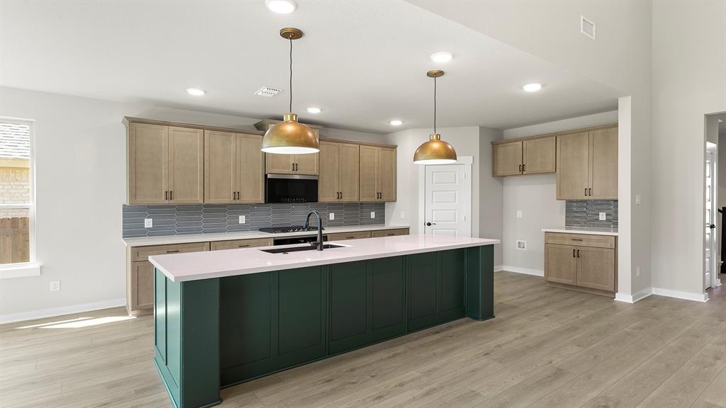 1527 Bridlepath Trail Forney, TX 75126 - Photo 10 of 29 08. 1527 Bridlepath - Kitchen (2)