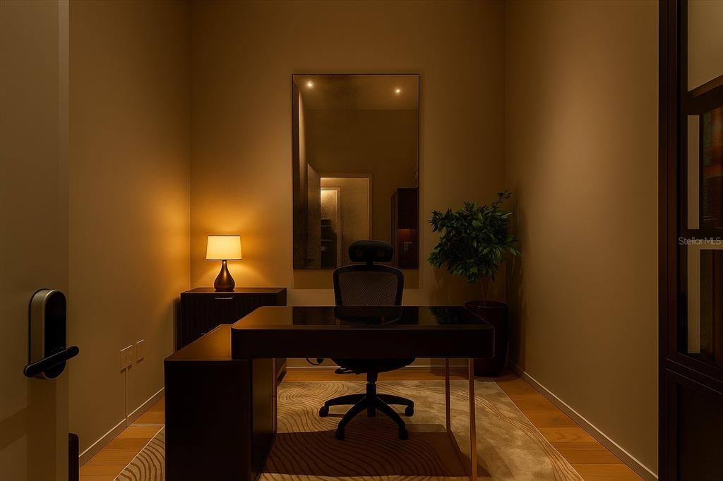 1020 Sunset Point Road, Unit 703 Clearwater, FL 33755 - Photo 18 of 50 a living room with furniture and a potted plant