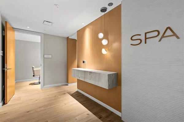 a bathroom with a sink and mirror