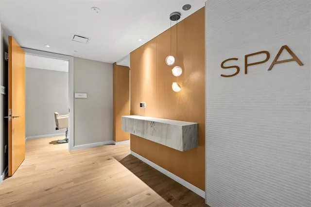 a bathroom with a sink and mirror