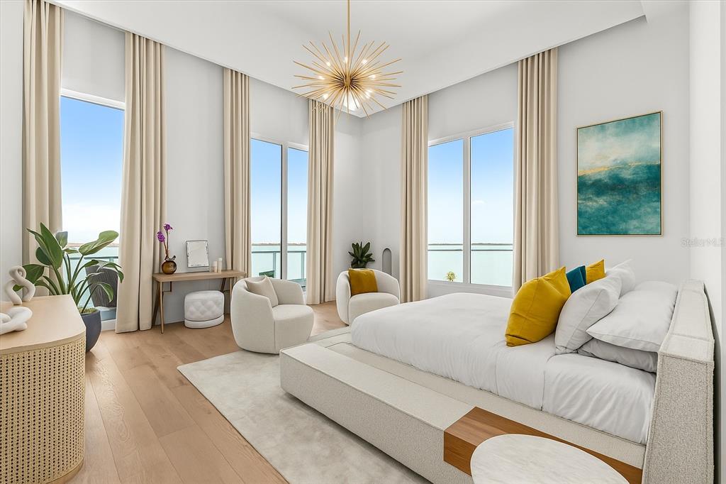 1020 Sunset Point Road, Unit 703 Clearwater, FL 33755 - Photo 5 of 50 a bedroom with a bed and a large window