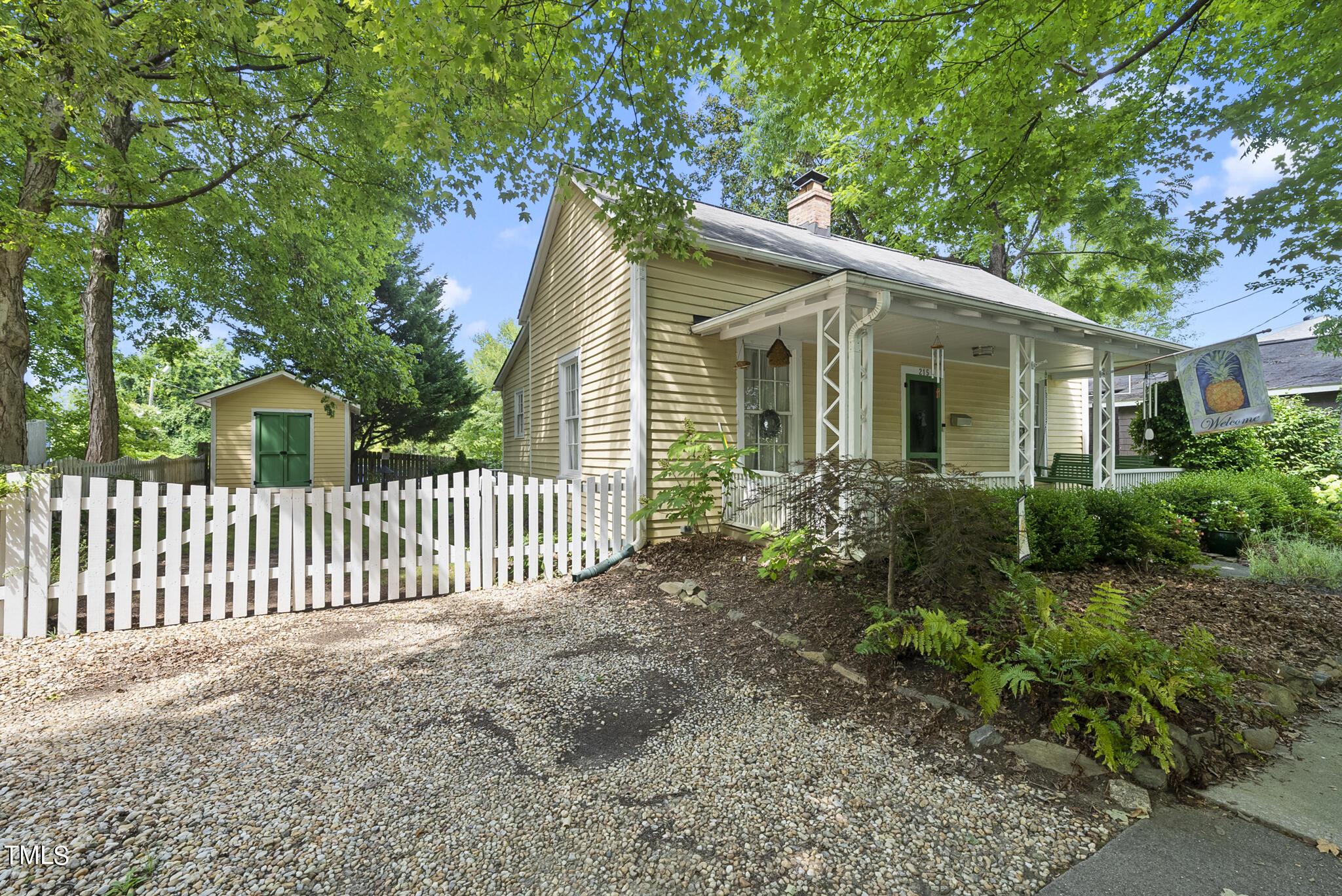 215 Pace Street Raleigh, NC 27604 - Photo 2 of 25 a front view of a house with garden