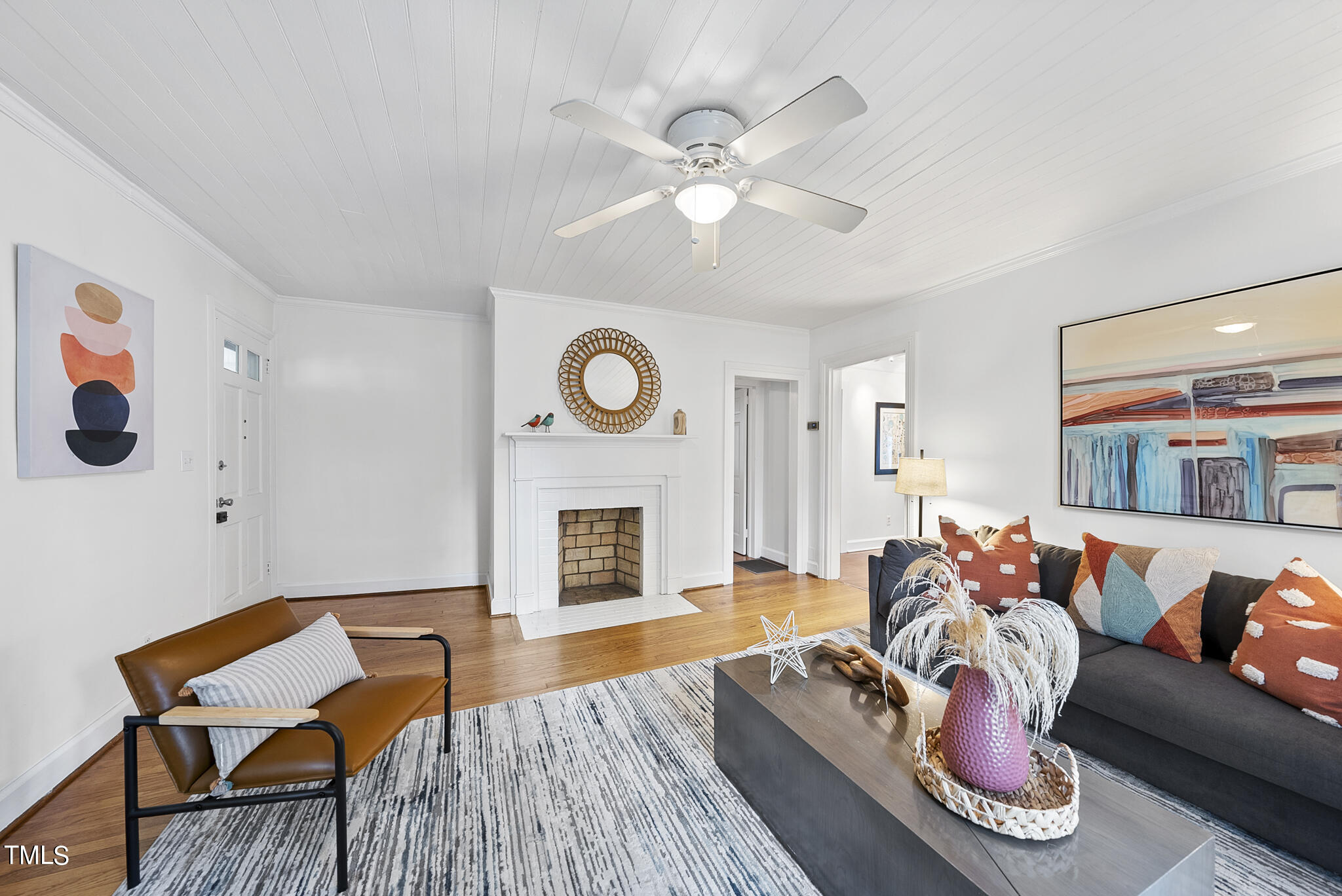 215 Pace Street Raleigh, NC 27604 - Photo 4 of 25 a living room with furniture and a fireplace