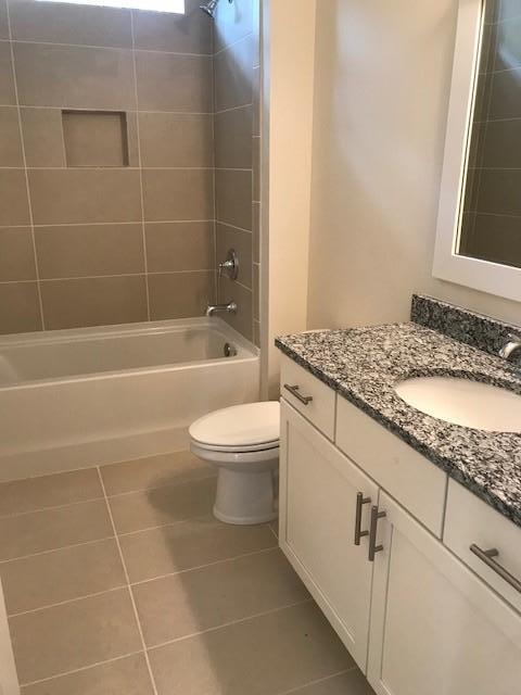 275 Grande Pointe Circle Inlet Beach, FL 32461 - Photo 13 of 44 a bathroom with a granite countertop sink a toilet and bathtub