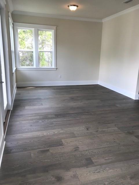 275 Grande Pointe Circle Inlet Beach, FL 32461 - Photo 21 of 44 an empty room with wooden floor and windows