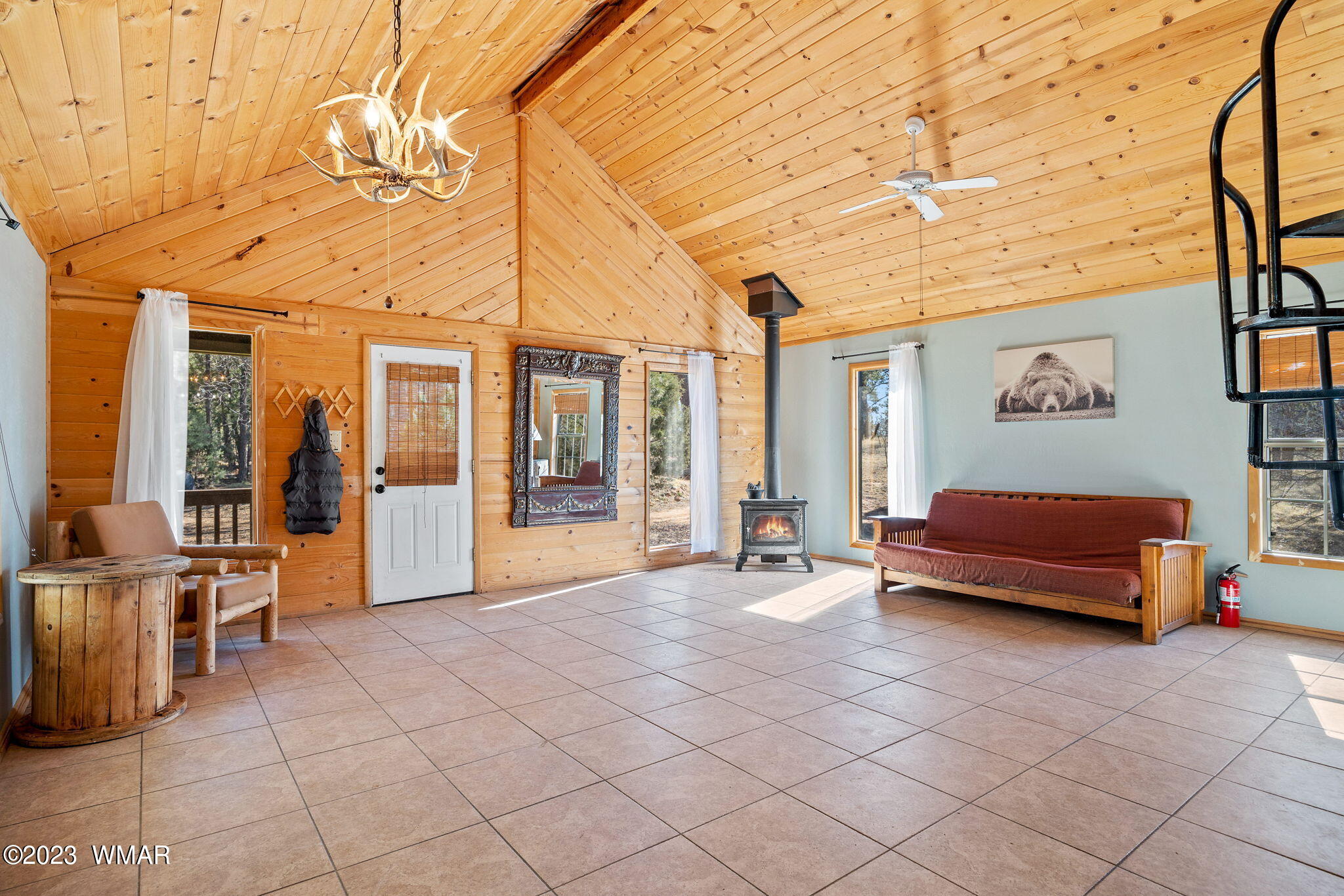 2001 Judy Ranch Road Overgaard, AZ 85933 - Photo 20 of 41 a bedroom with furniture and large windows