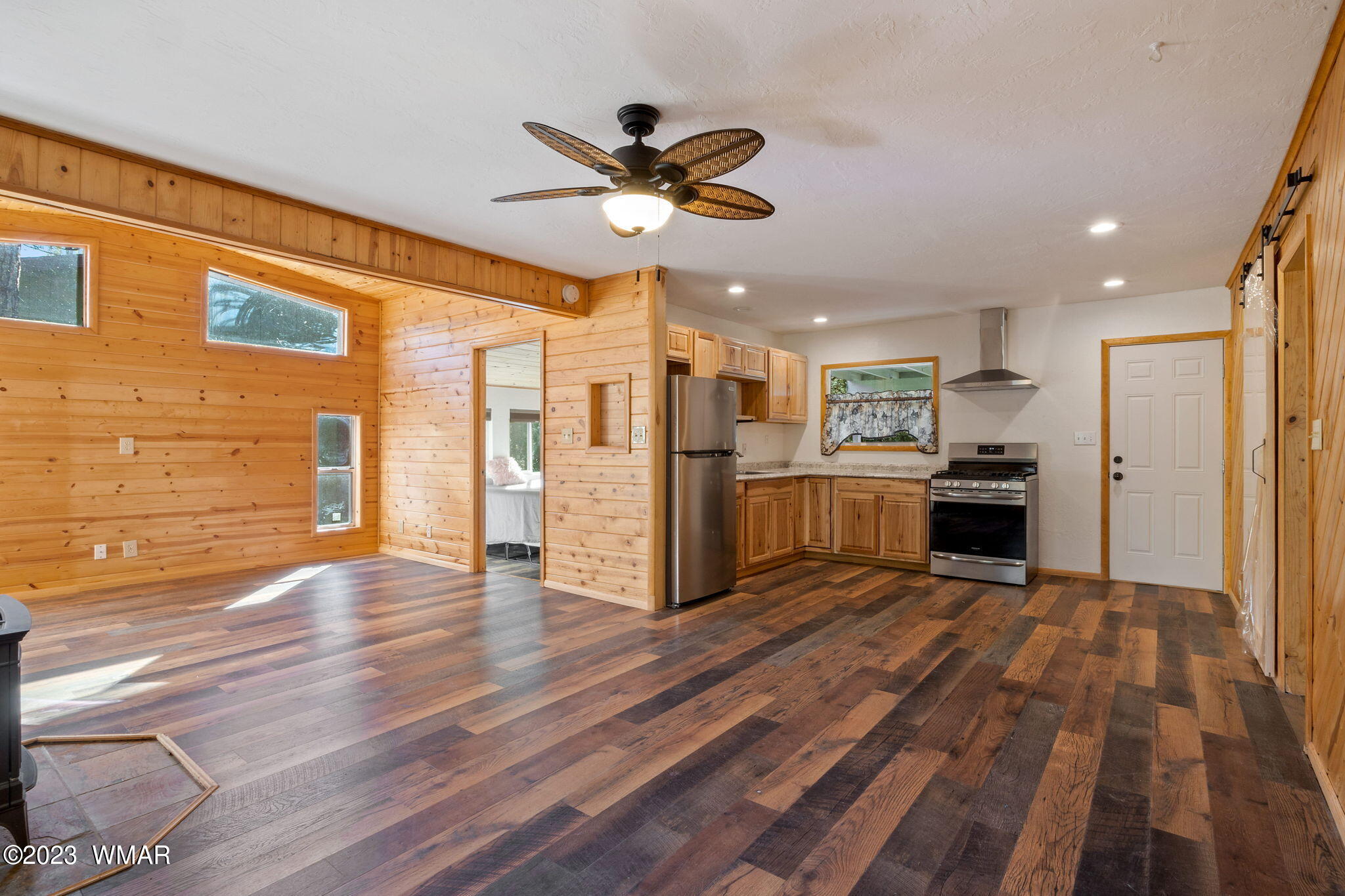2001 Judy Ranch Road Overgaard, AZ 85933 - Photo 6 of 41 a view of a kitchen with wooden floor and a kitchen
