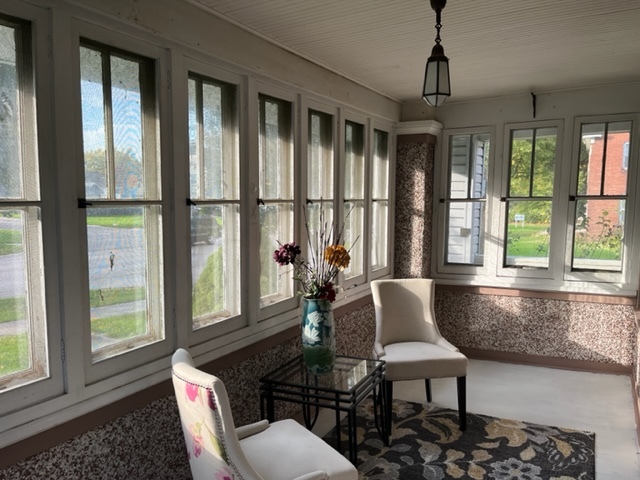 829 North 7th Street Rochelle, IL 61068 - Photo 3 of 24 a living room with furniture and a window