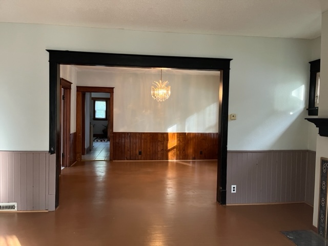 829 North 7th Street Rochelle, IL 61068 - Photo 8 of 24 a view of a hallway with wooden floor