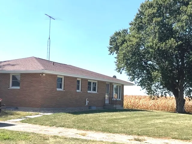 a house view with a garden space