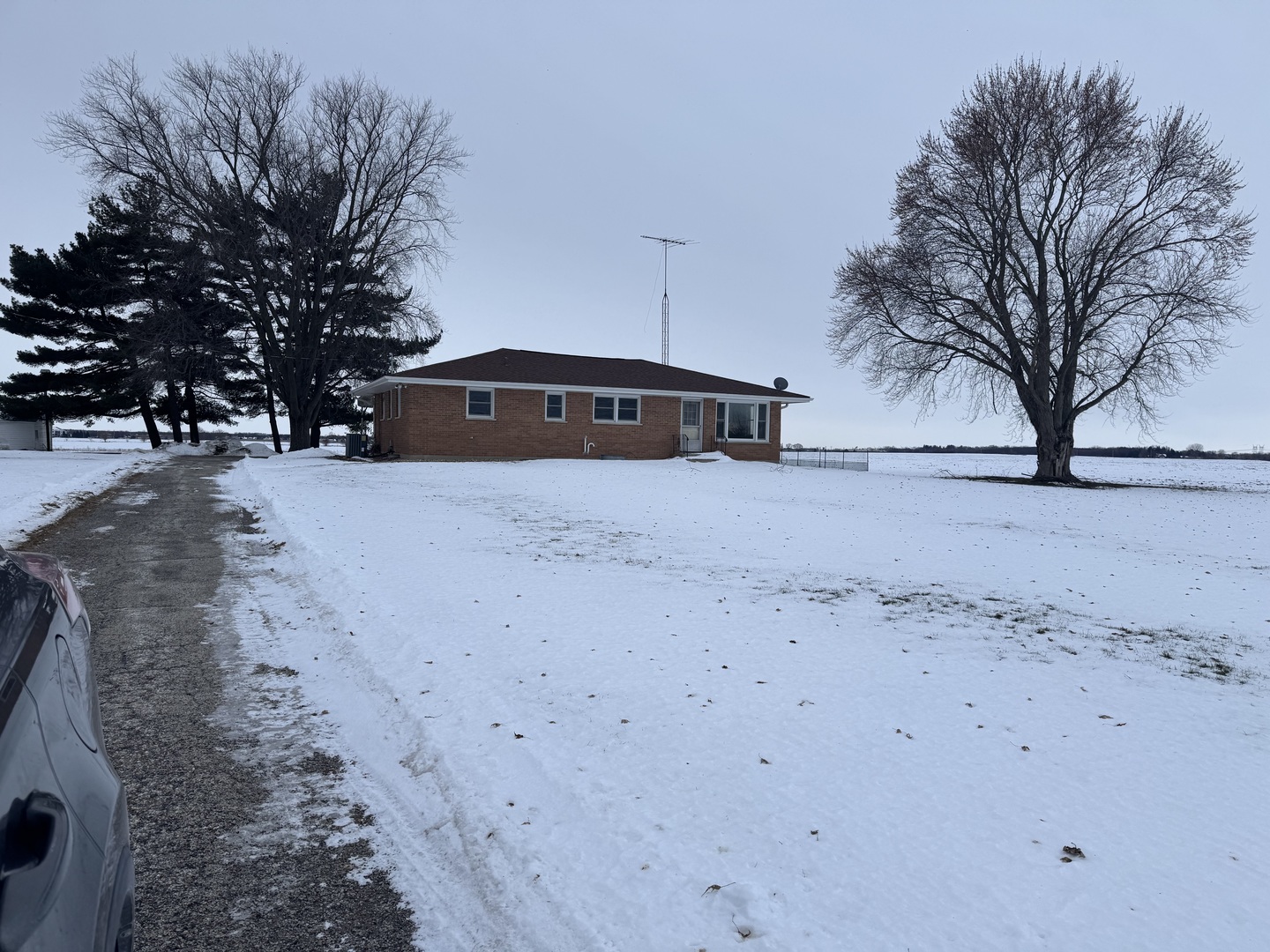 11268 Faxon Road Yorkville, IL 60560 - Photo 13 of 13 a front view of a house with a yard