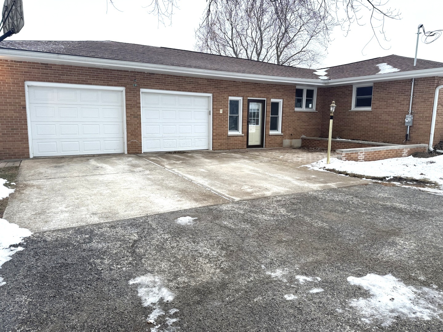 11268 Faxon Road Yorkville, IL 60560 - Photo 2 of 13 a view of a house with a yard and garage