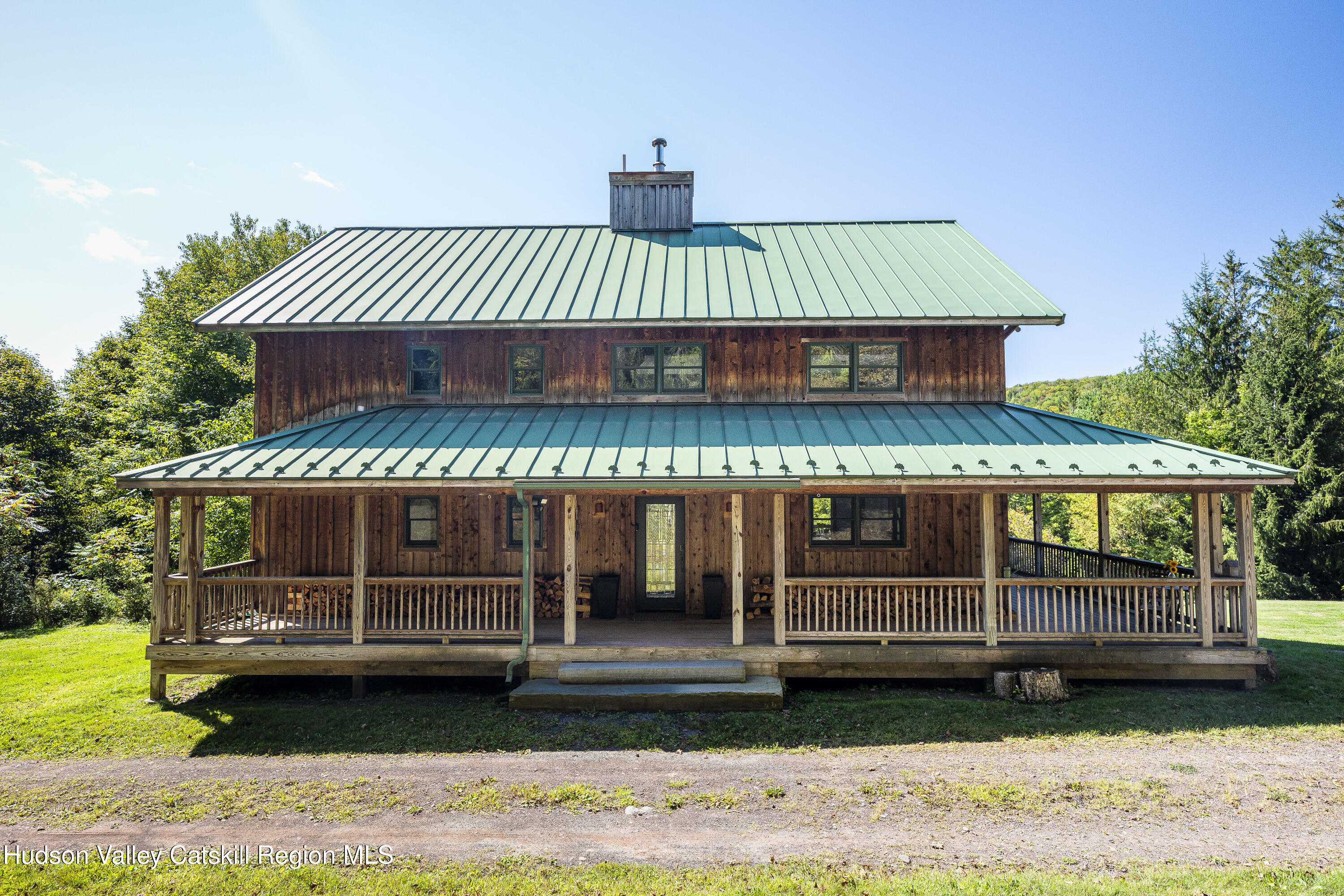 396 Doig Hollow Road Bovina, NY 13731 - Photo 12 of 44 a view of a house with a yard