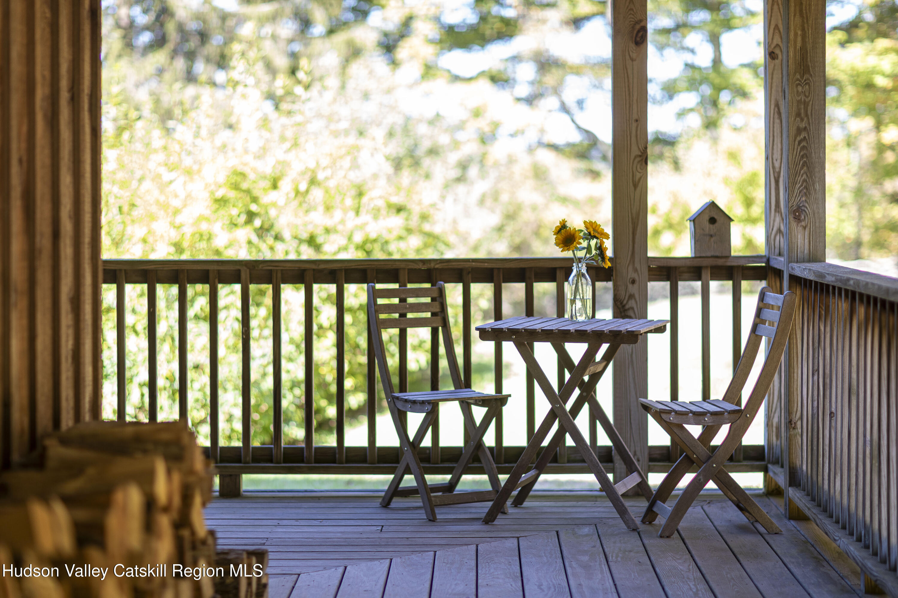 396 Doig Hollow Road Bovina, NY 13731 - Photo 13 of 44 a view of a chairs and table in the balcony
