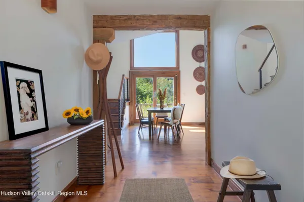 a view of dining room and wooden floor