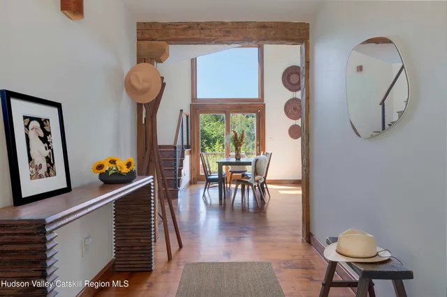 a view of dining room and wooden floor