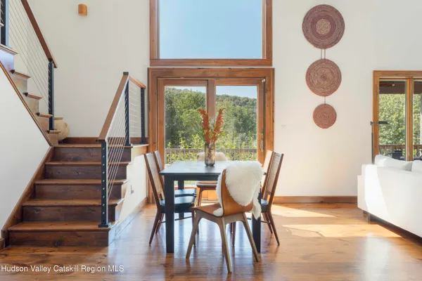 a view of entryway with wooden floor