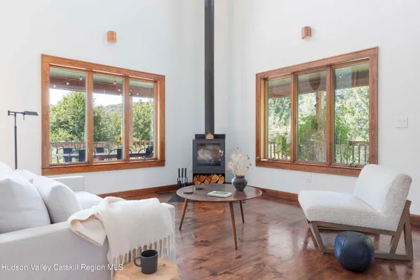 a living room with furniture and a window