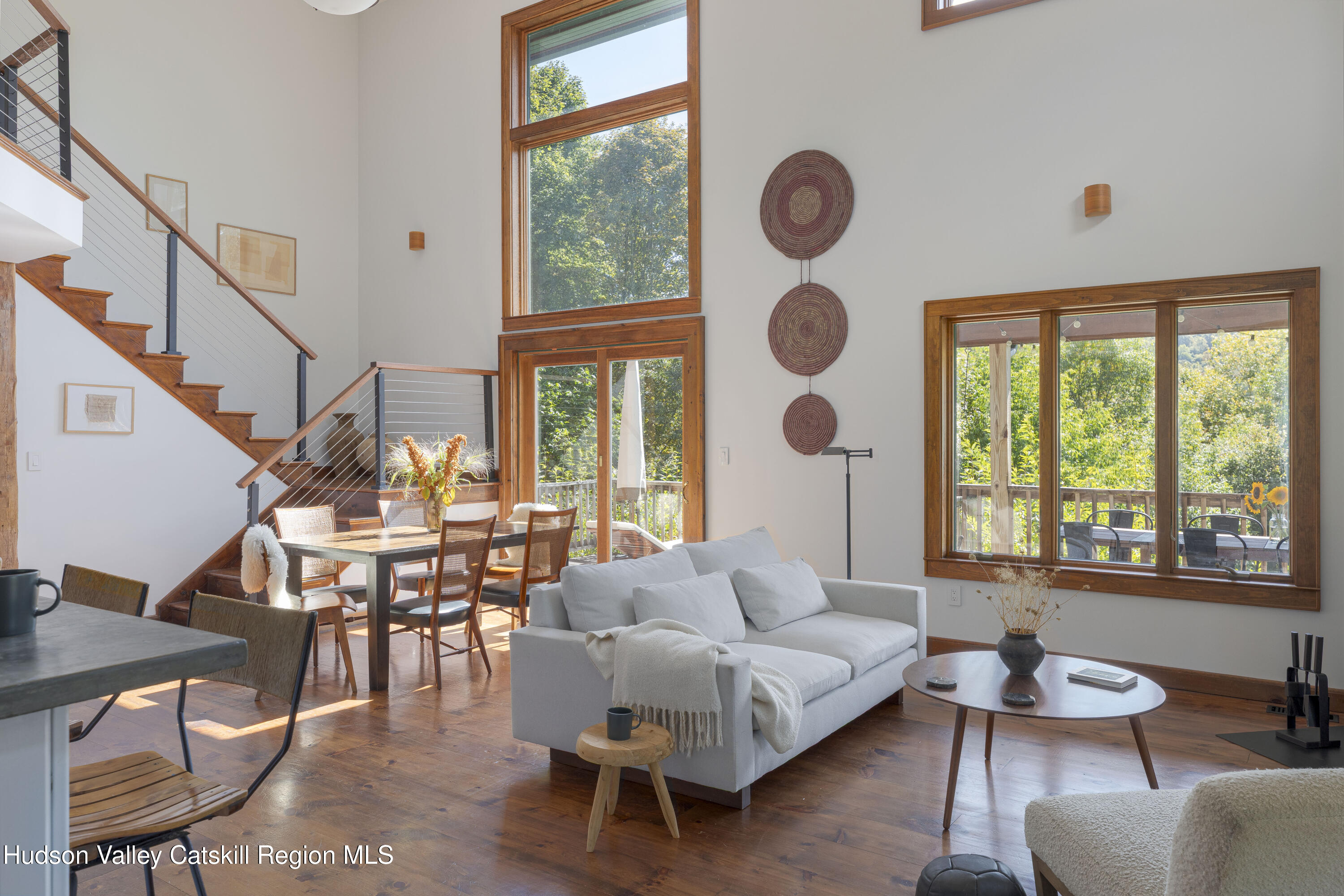 396 Doig Hollow Road Bovina, NY 13731 - Photo 20 of 44 a living room with furniture and a window