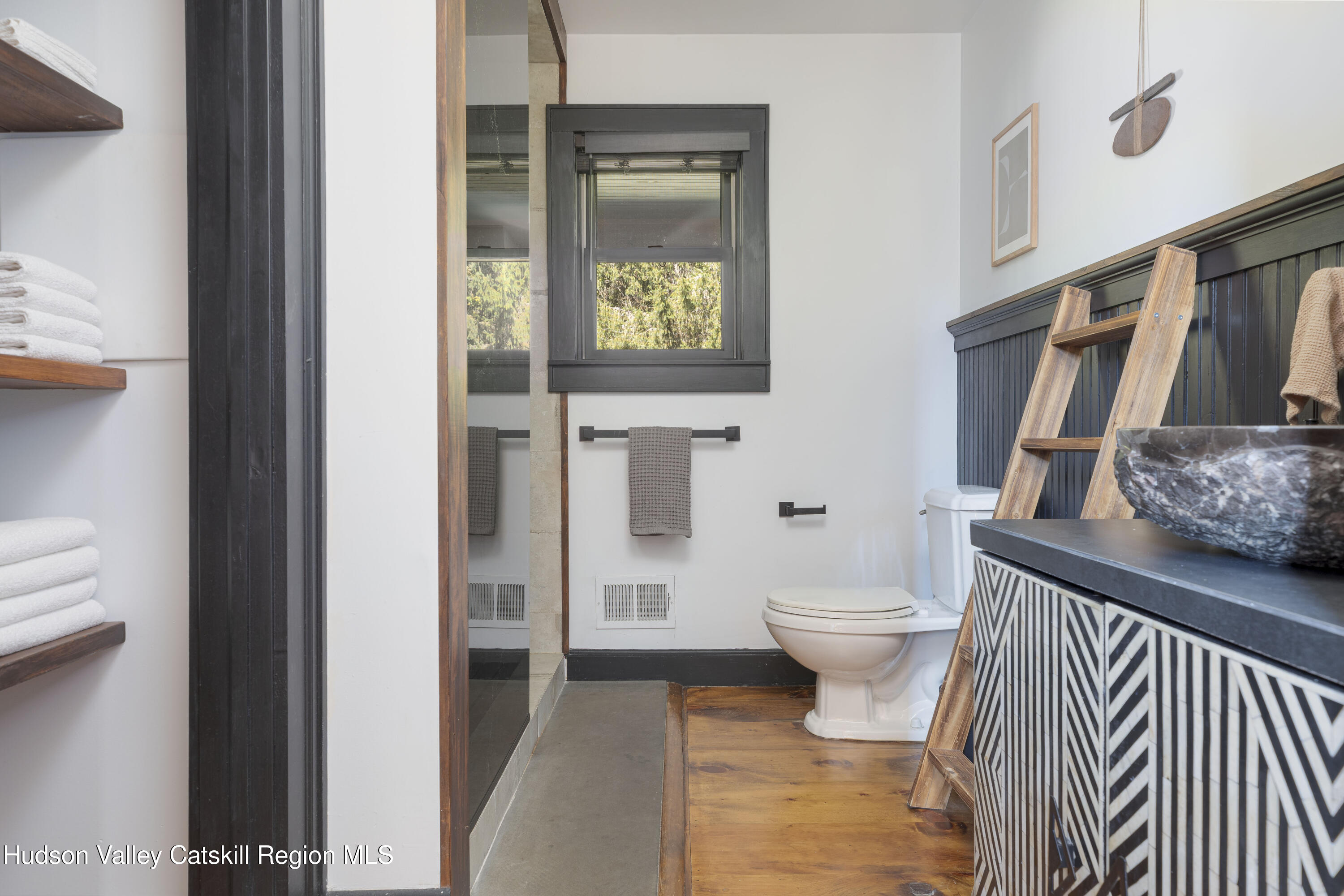 396 Doig Hollow Road Bovina, NY 13731 - Photo 25 of 44 a bathroom with a toilet and a shower