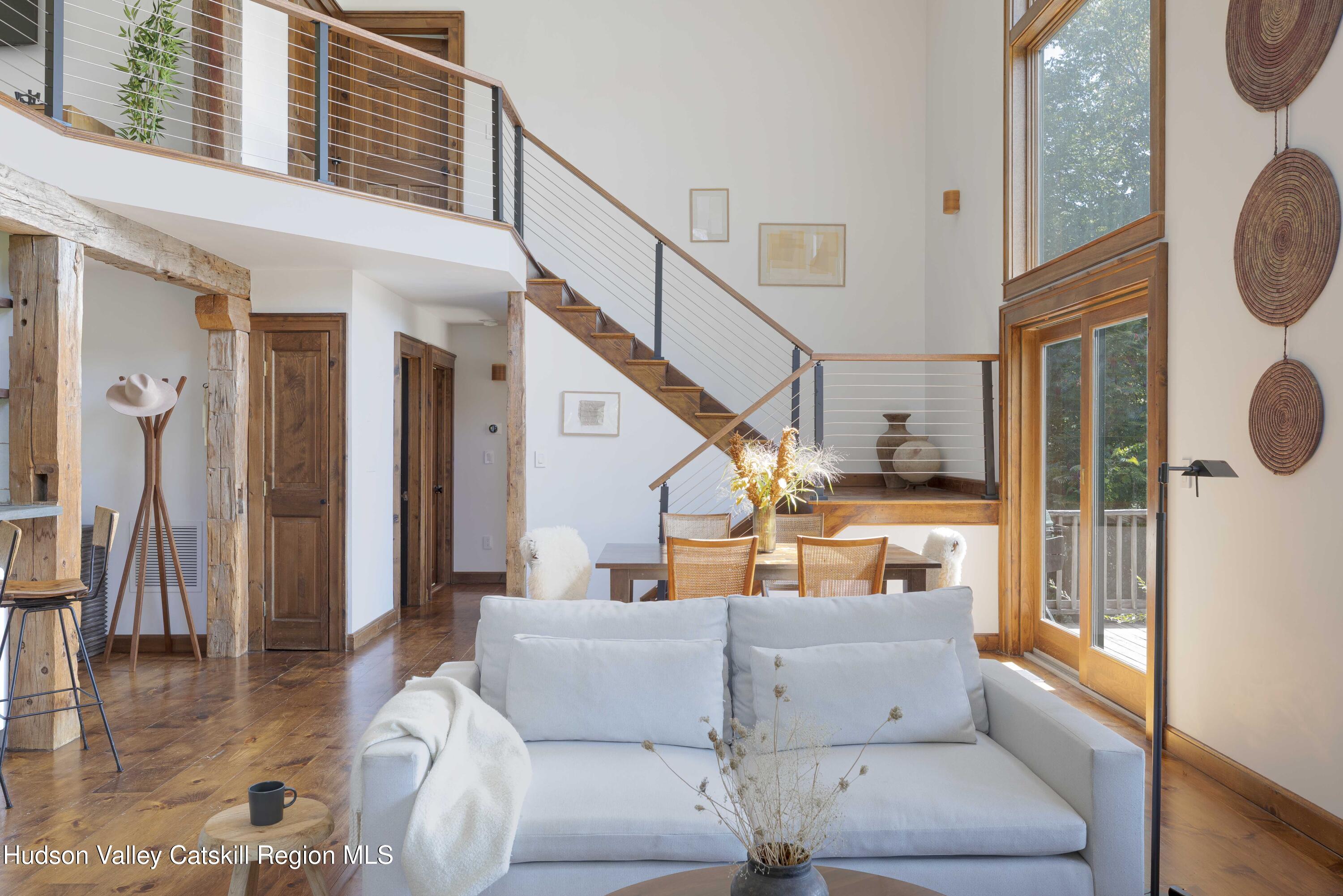 396 Doig Hollow Road Bovina, NY 13731 - Photo 30 of 44 a outdoor living space with furniture and a fireplace