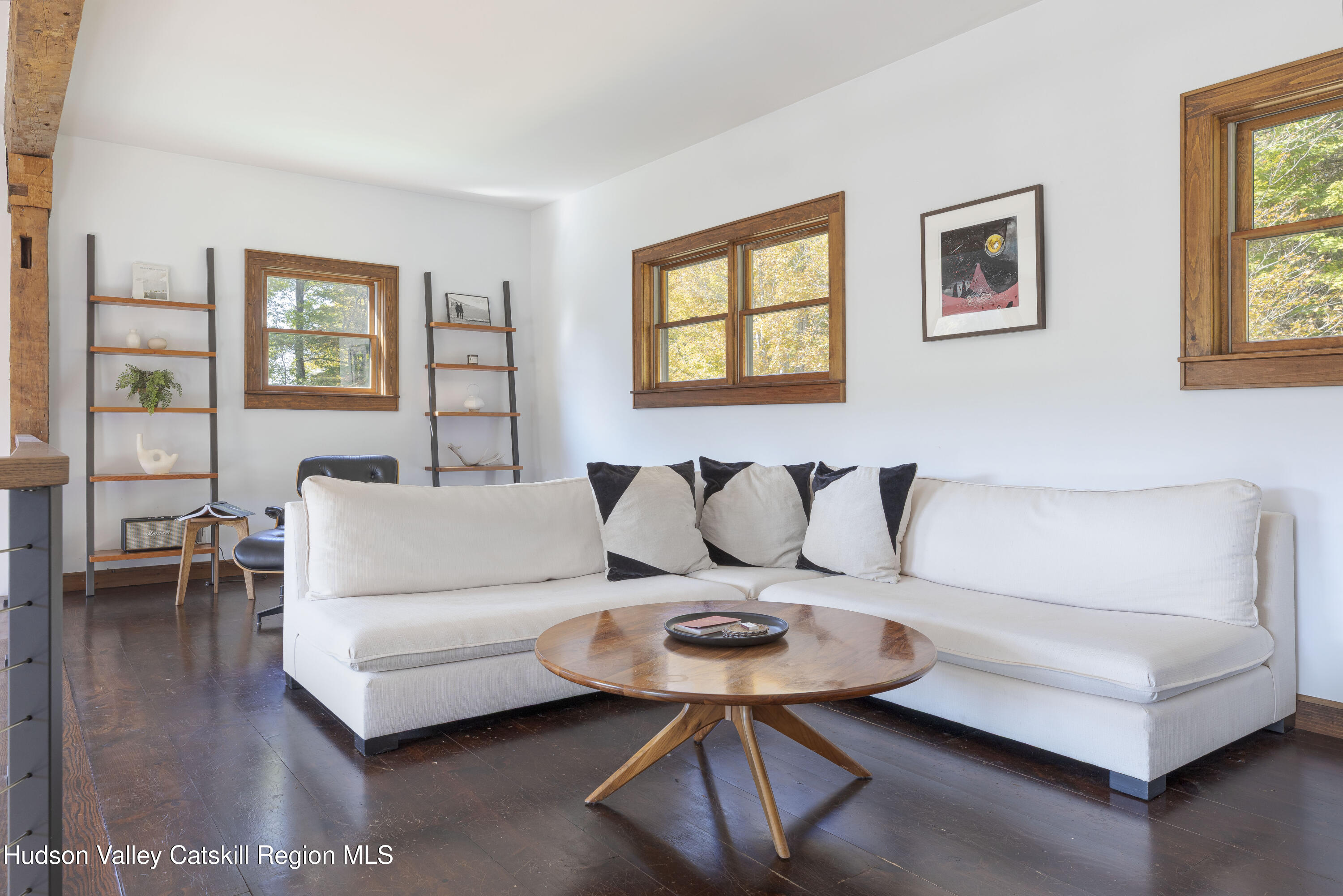 396 Doig Hollow Road Bovina, NY 13731 - Photo 31 of 44 a living room with furniture and a window