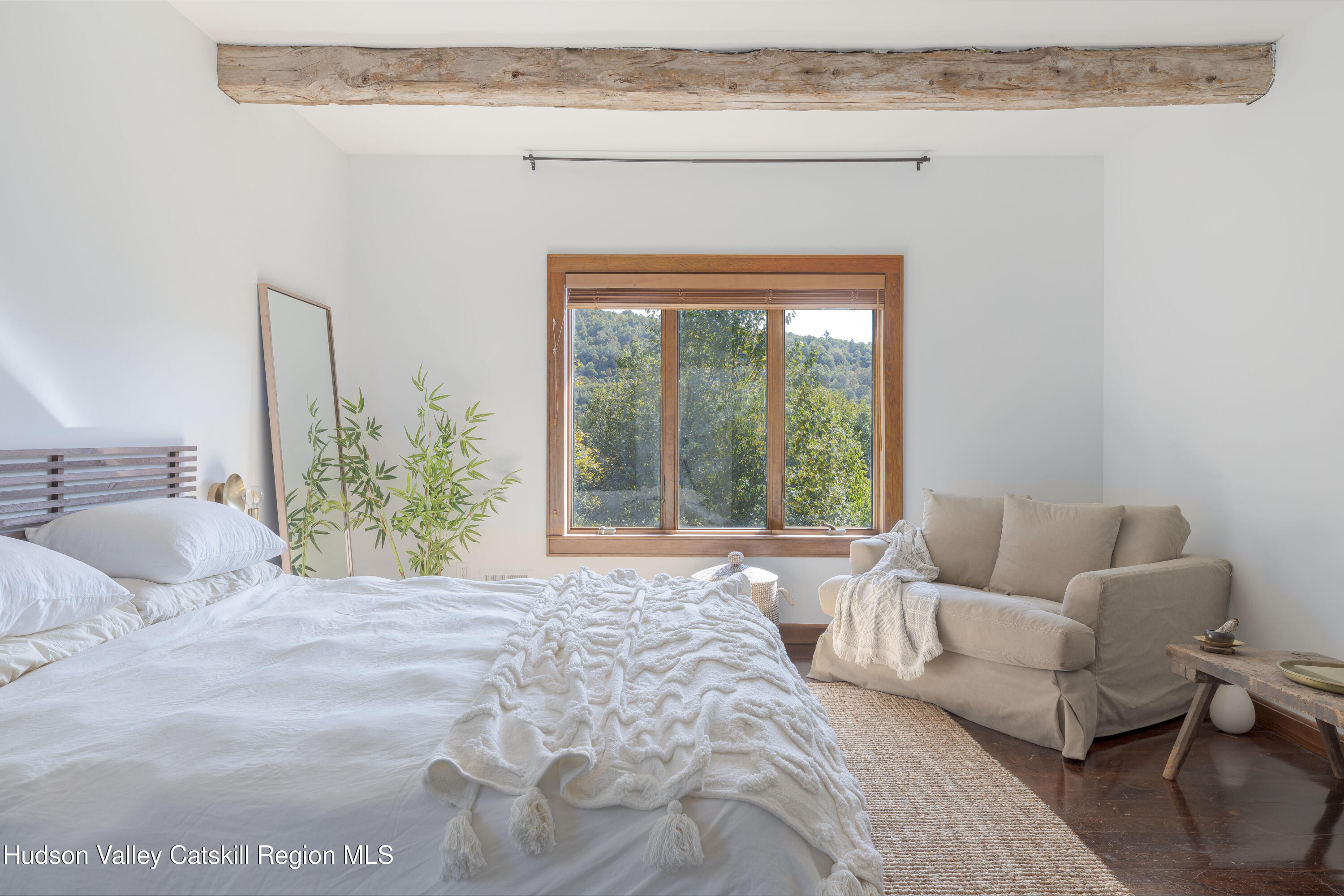 396 Doig Hollow Road Bovina, NY 13731 - Photo 34 of 44 a bedroom with a bed and a window