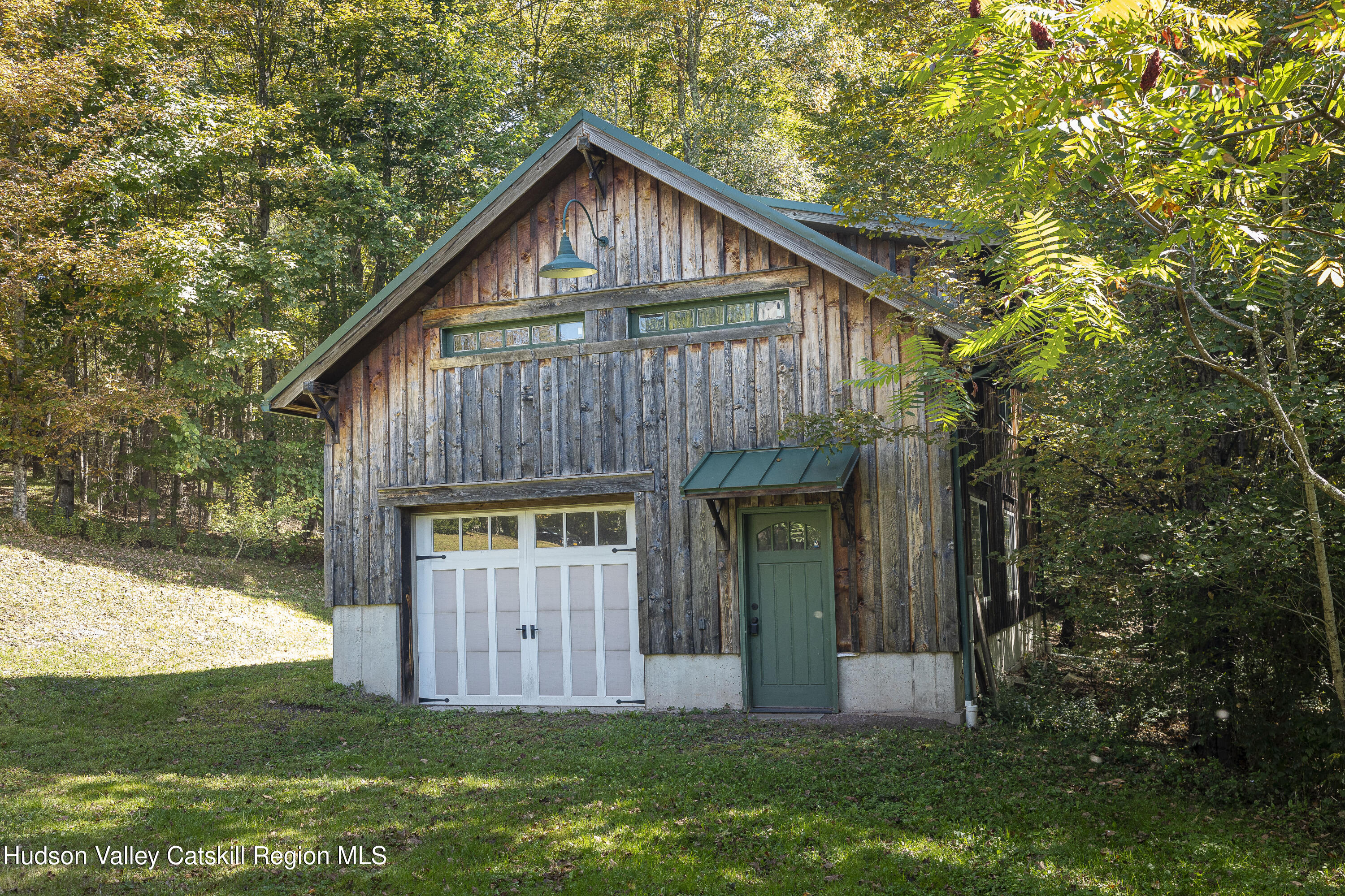396 Doig Hollow Road Bovina, NY 13731 - Photo 41 of 44 a front view of a house with garden