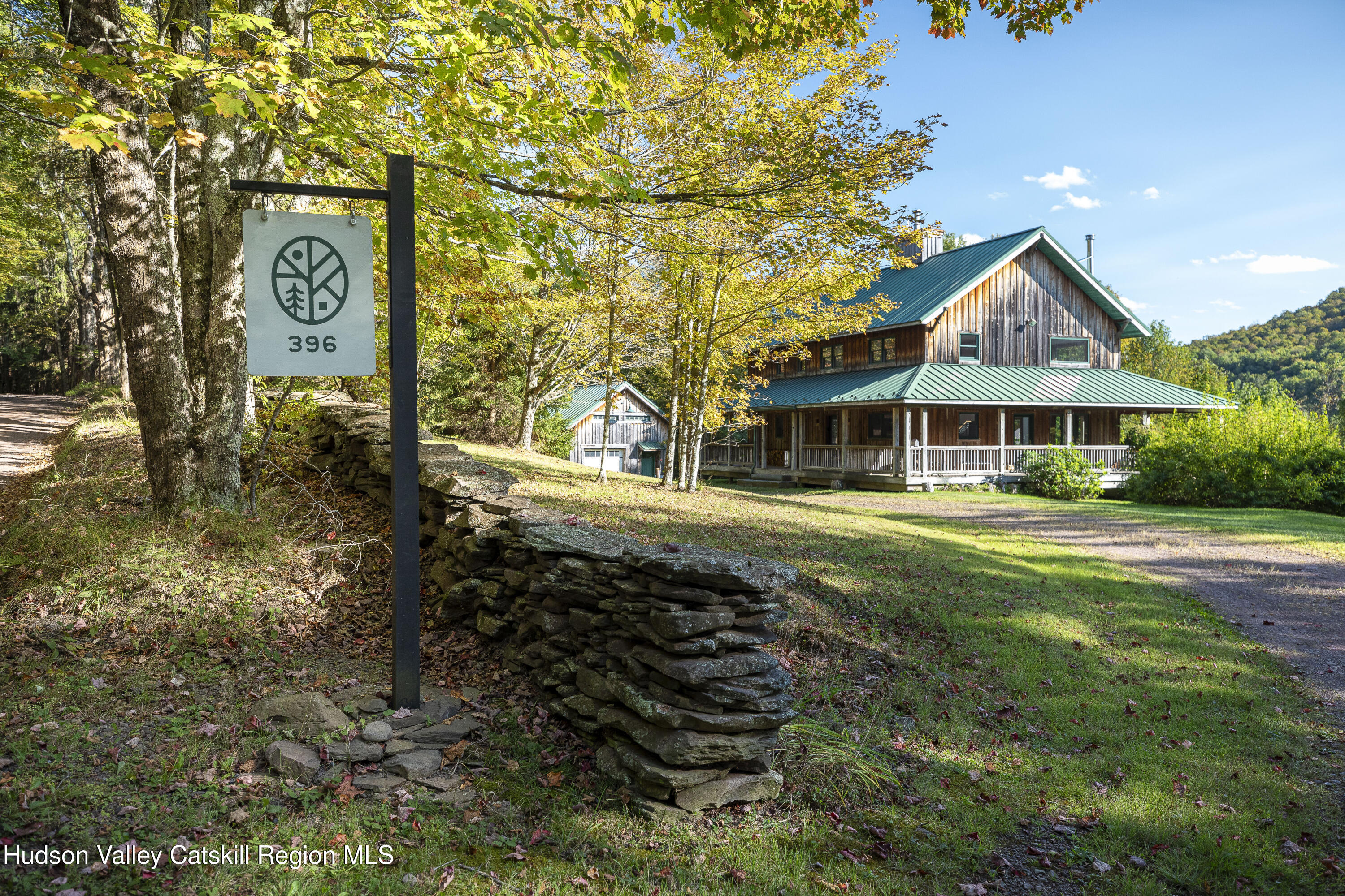 396 Doig Hollow Road Bovina, NY 13731 - Photo 42 of 44 a front view of a house with a yard