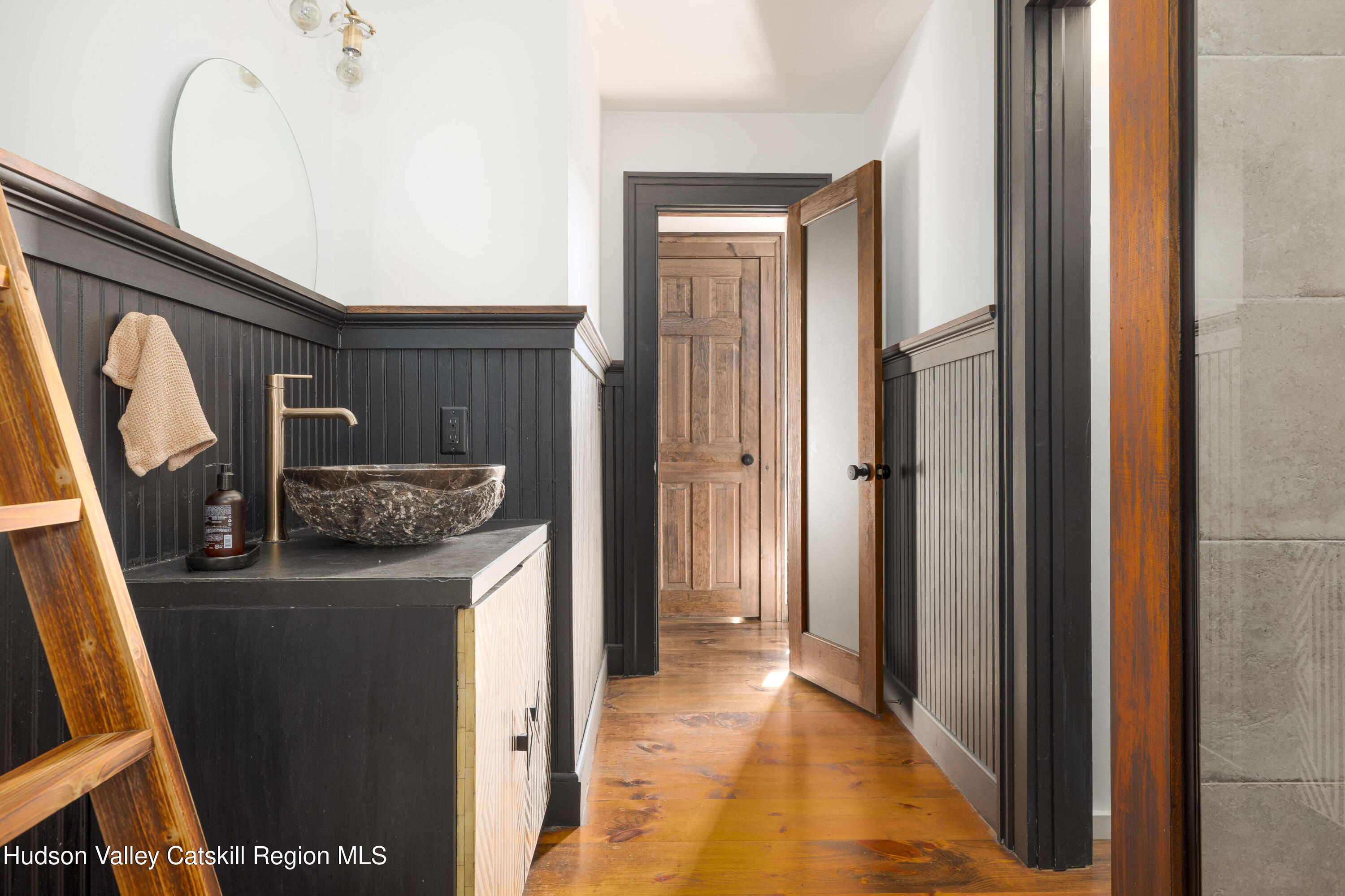 396 Doig Hollow Road Bovina, NY 13731 - Photo 6 of 44 a view of a hallway with elevator