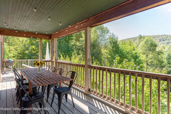 a view of a two chairs in the deck