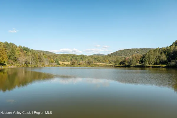 a view of an ocean and city