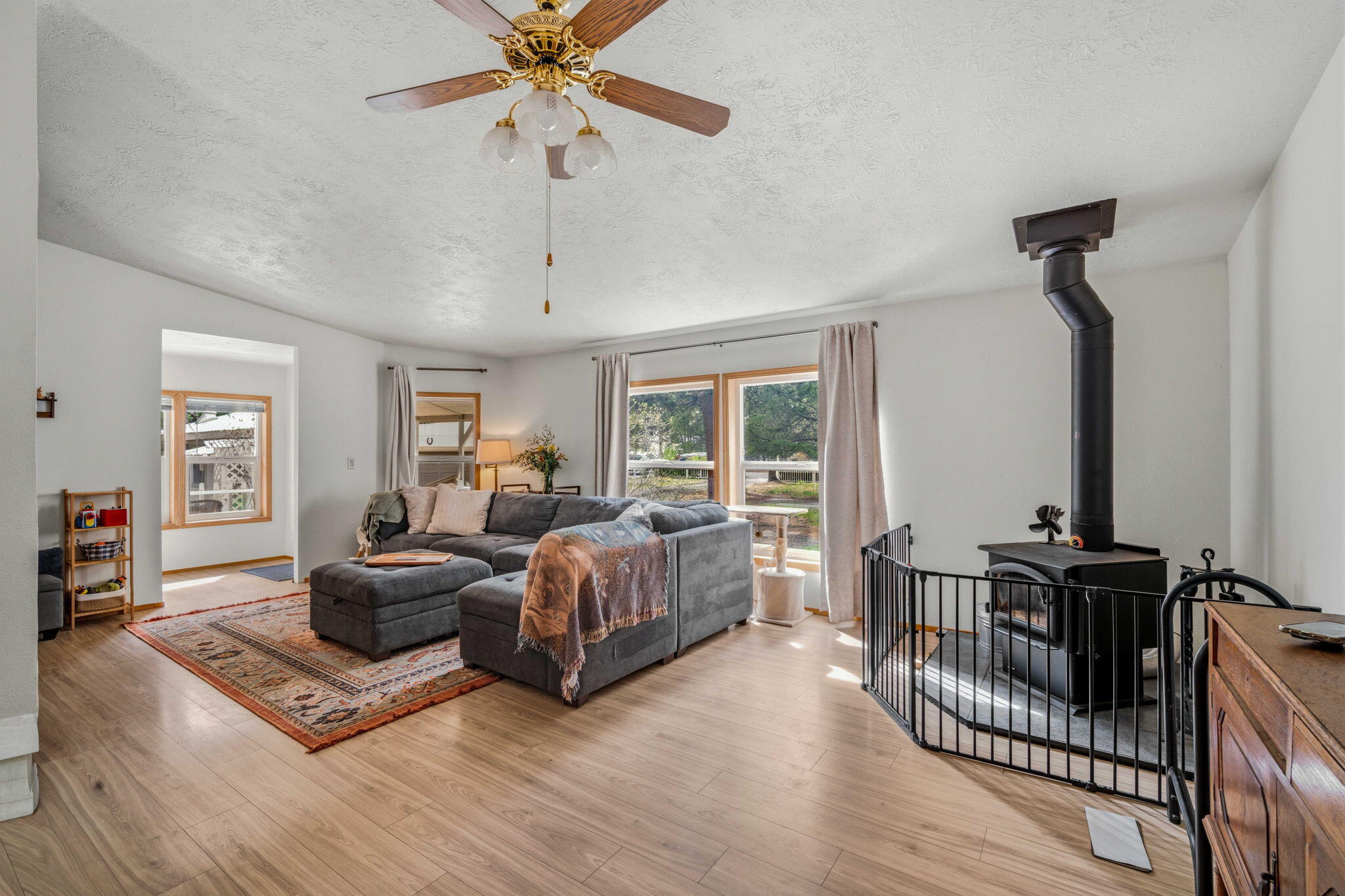 147135 Bills Road Gilchrist, OR 97737 - Photo 3 of 45 Spacious living room with a wood burning stove