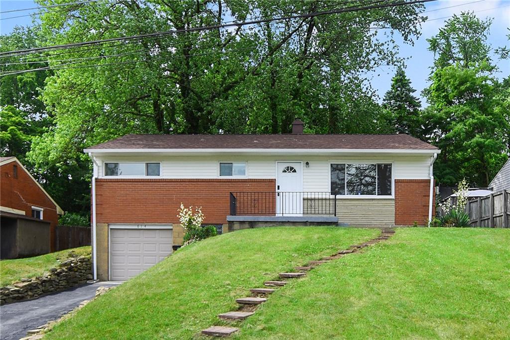 614 Springdale Drive Pittsburgh, PA 15235 - Photo 2 of 31 a view of a house with a yard and sitting area
