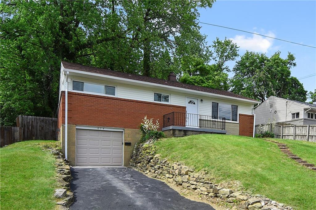 614 Springdale Drive Pittsburgh, PA 15235 - Photo 3 of 31 a front view of house with yard and green space