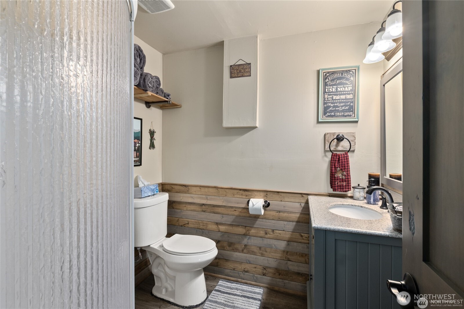 110 Deer Point Lane Ronald, WA 98940 - Photo 23 of 40 a bathroom with a toilet sink and mirror