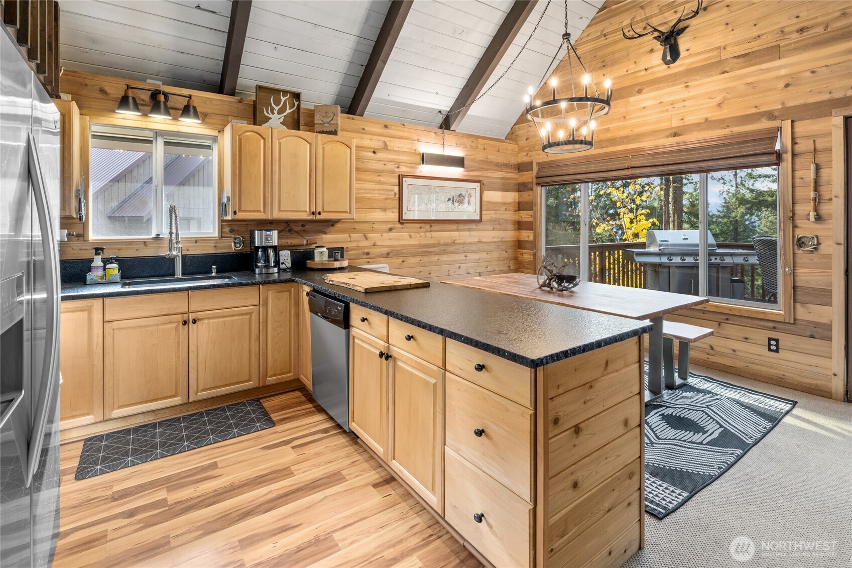 110 Deer Point Lane Ronald, WA 98940 - Photo 6 of 40 a kitchen with stainless steel appliances granite countertop a sink and a stove