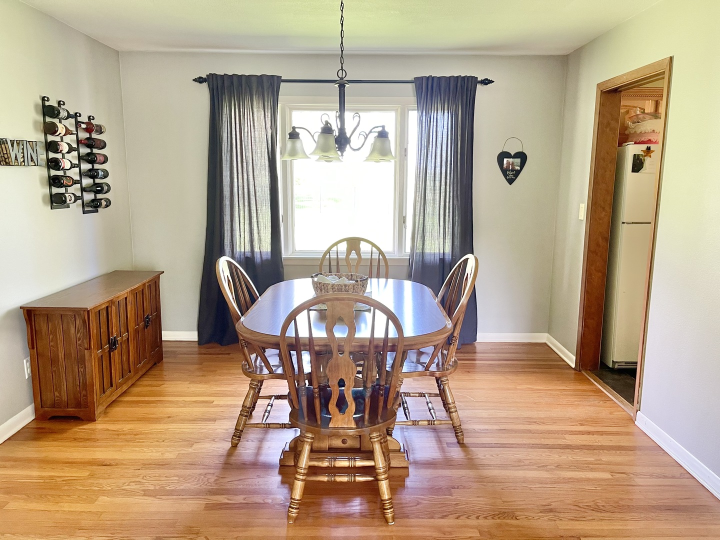 2561 East 259th Road Peru, IL 61354 - Photo 11 of 26 a view of a dining room with furniture window and wooden floor