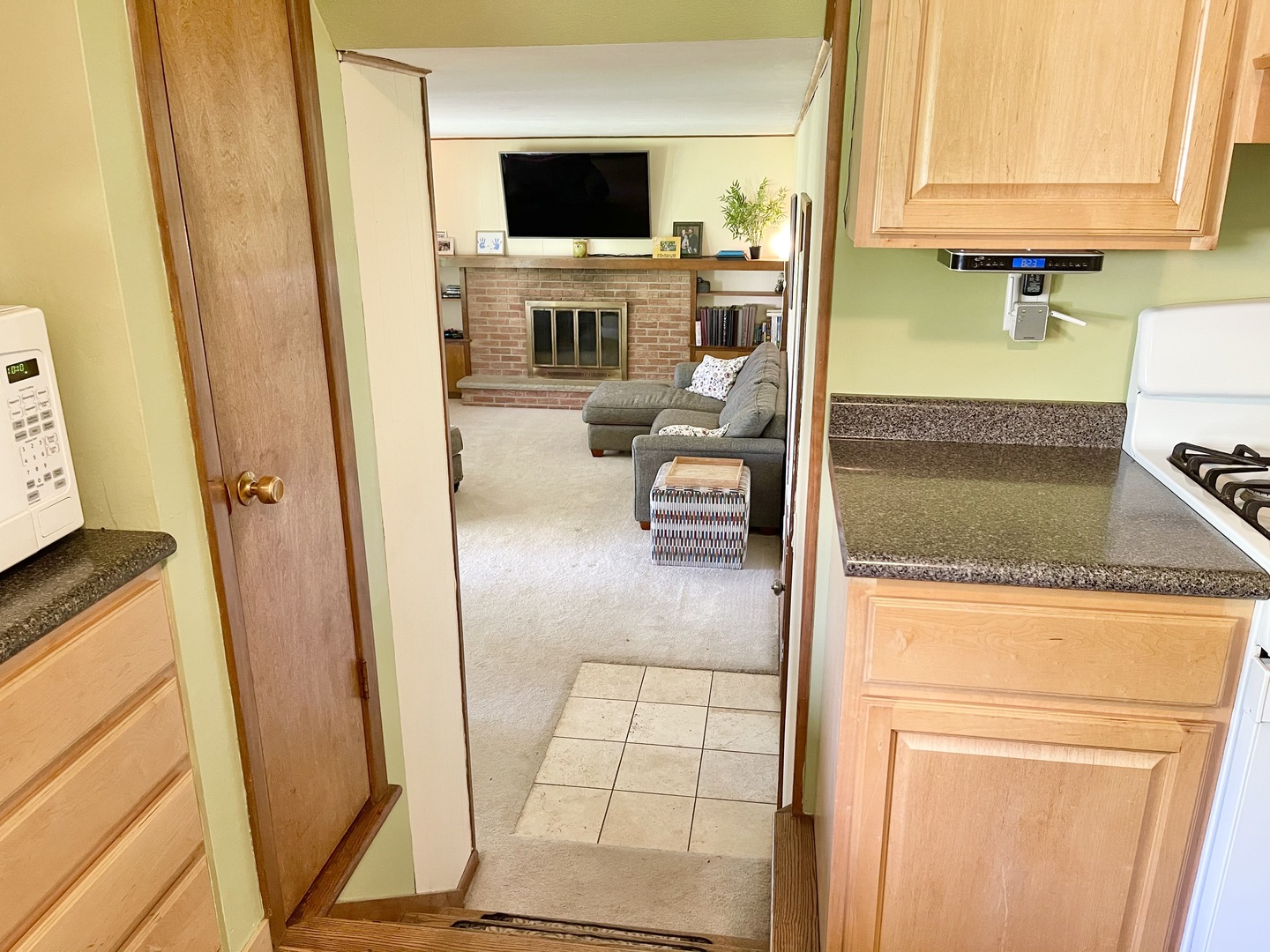 2561 East 259th Road Peru, IL 61354 - Photo 16 of 26 view of living room with furniture and flat screen tv