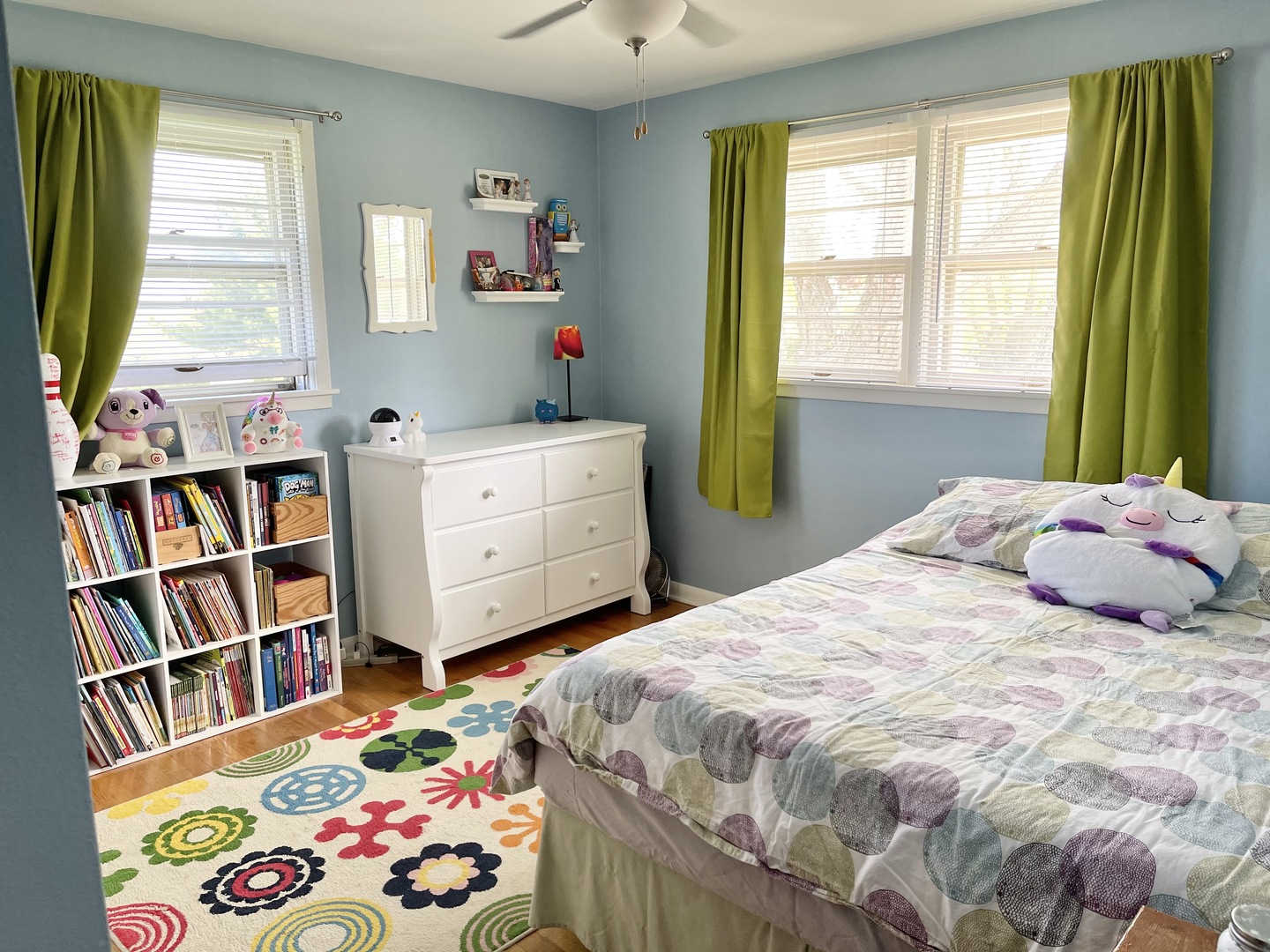 2561 East 259th Road Peru, IL 61354 - Photo 19 of 26 a bedroom with a bed and a book shelf