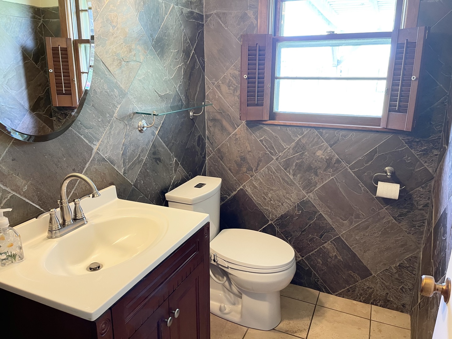 2561 East 259th Road Peru, IL 61354 - Photo 23 of 26 a bathroom with a sink mirror vanity and toilet