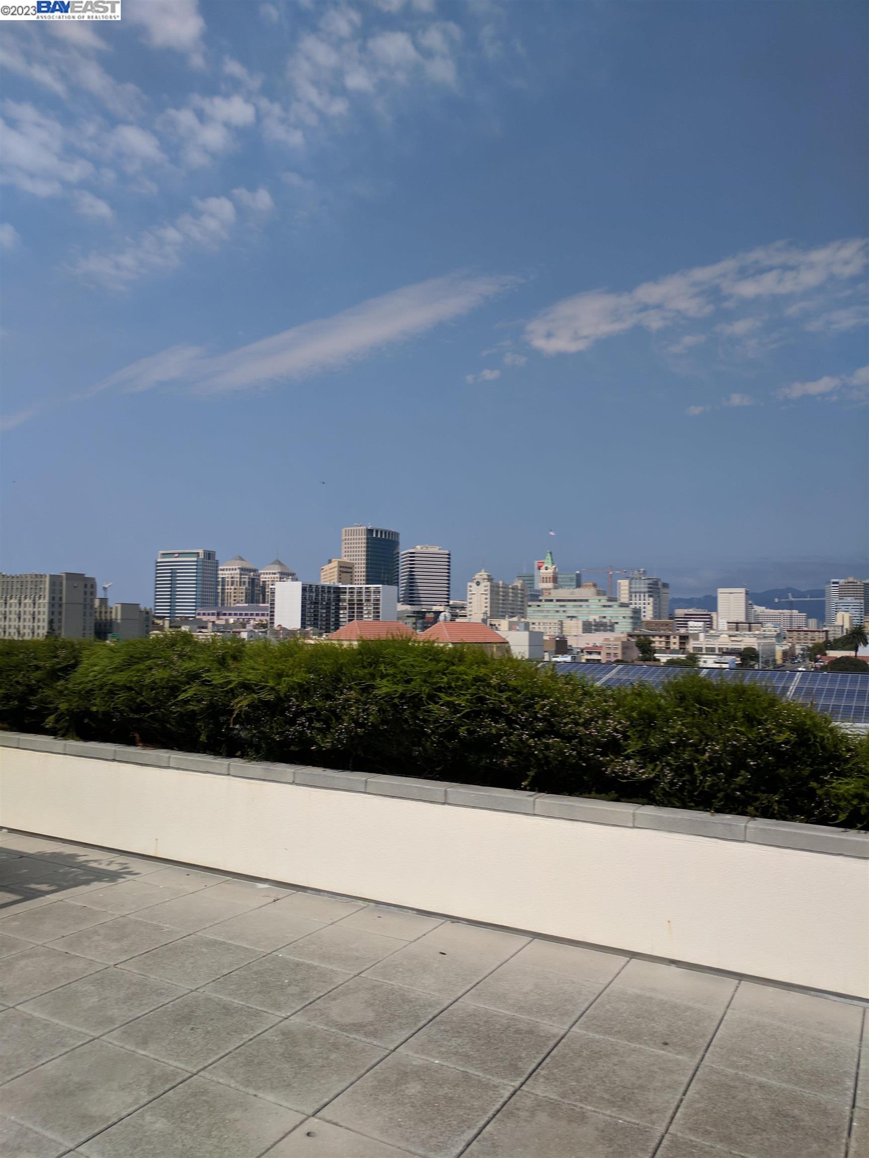 288 3rd Street, Unit 407 Oakland, CA 94607 - Photo 24 of 24 a view of city with tall buildings in background