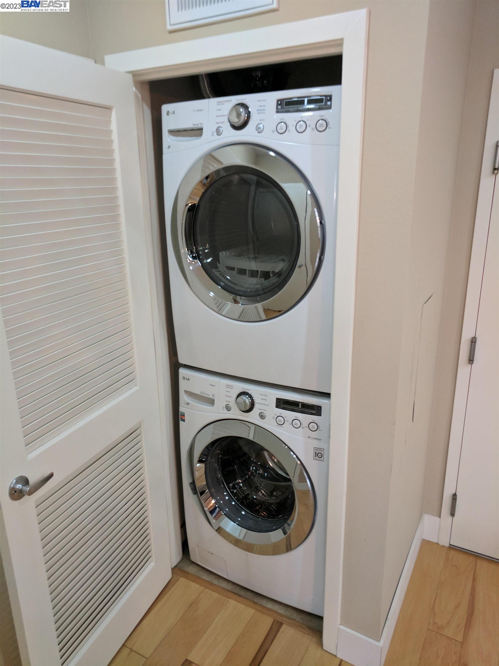 288 3rd Street, Unit 407 Oakland, CA 94607 - Photo 9 of 24 a utility room with dryer and washer