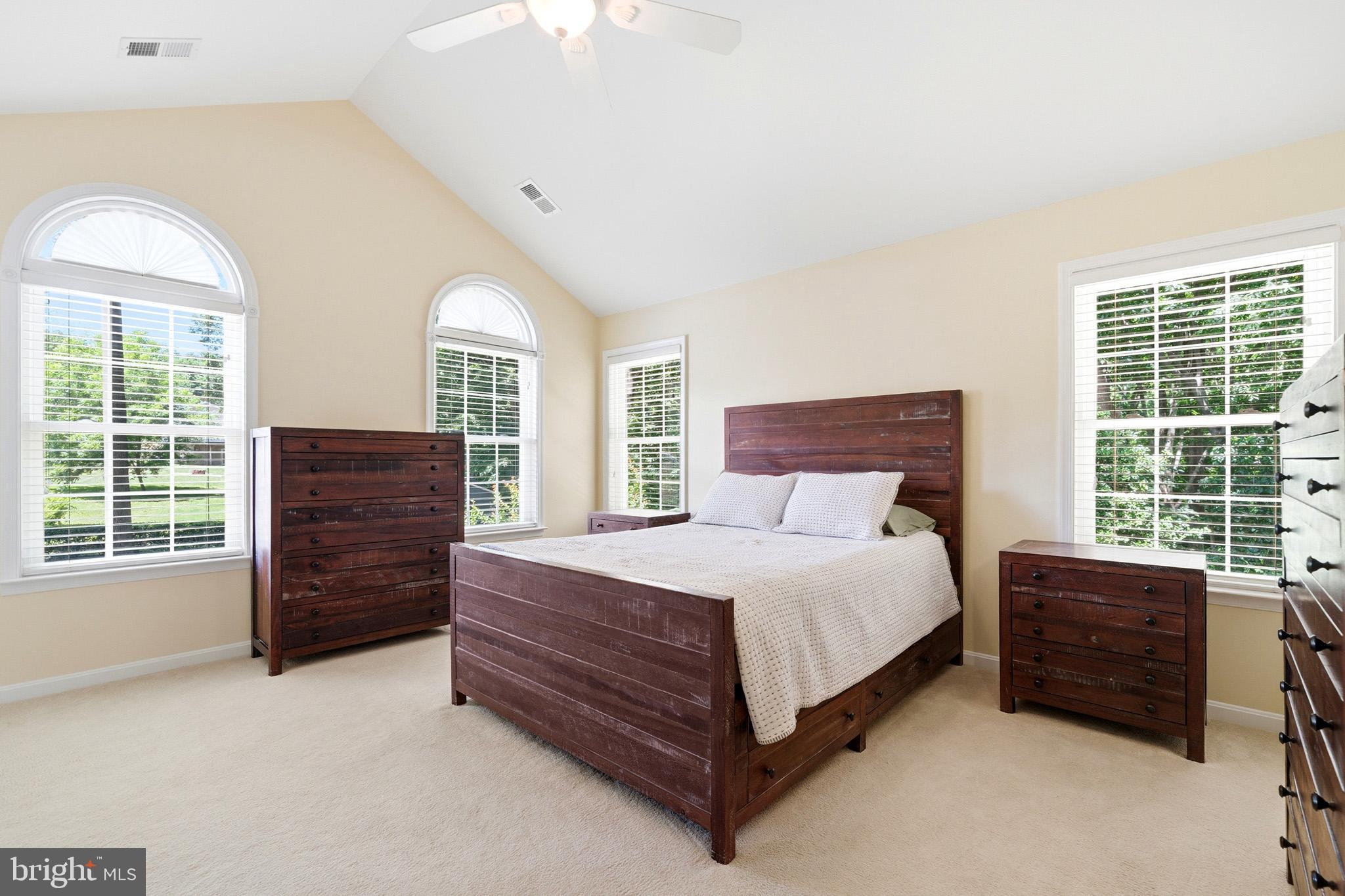 3148 Holland Cliffs Road Huntingtown, MD 20639 - Photo 19 of 61 Peaceful primary suite with vaulted ceilings!
