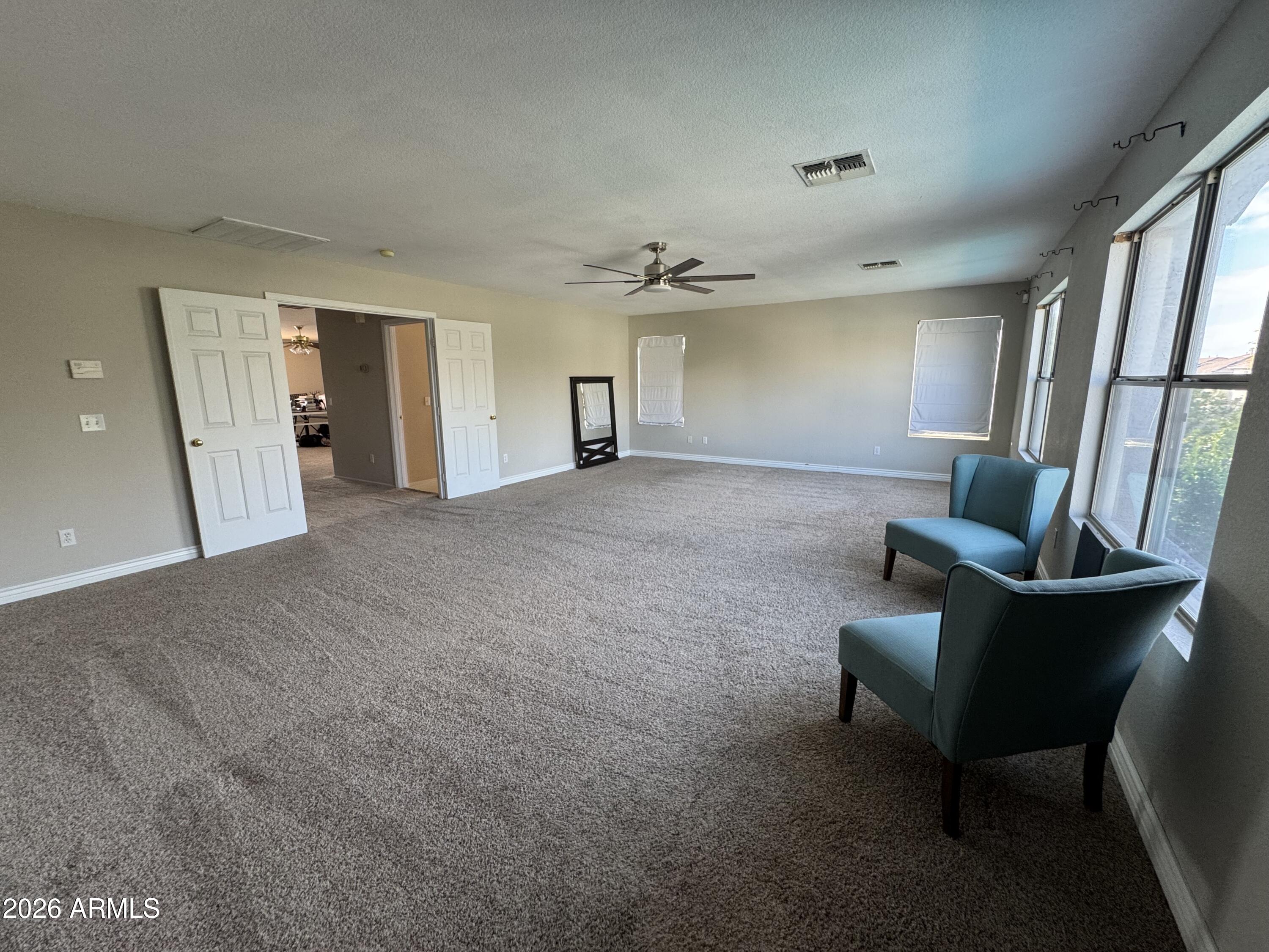 3750 East Orchid Lane Gilbert, AZ 85296 - Photo 18 of 43 a view of livingroom with furniture and wooden floor